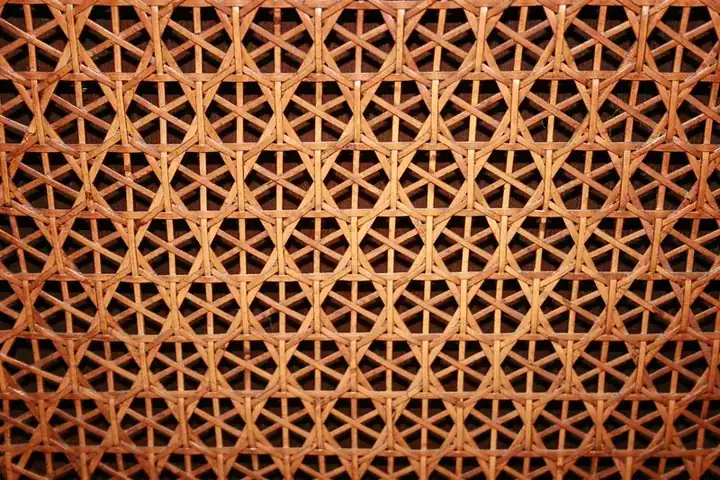 Cane and rattan sofa on solid wood frame