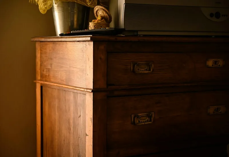 Weathered grey solid wood dresser in the Restoration Hardware aesthetic