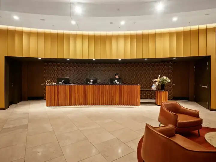 Solid-wood hotel guest-room casegoods and beds